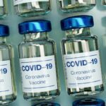 Are Adverse Reactions to Employer-Mandated Vaccinations Eligible for Workers' Compensation?